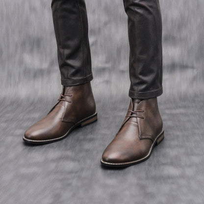 Everyday men's dark brown leather ankle boots, combining comfort with a durable, casual design.