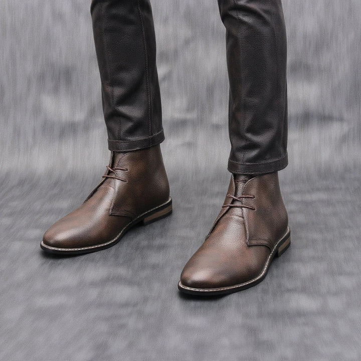 Everyday men's dark brown leather ankle boots, combining comfort with a durable, casual design.
