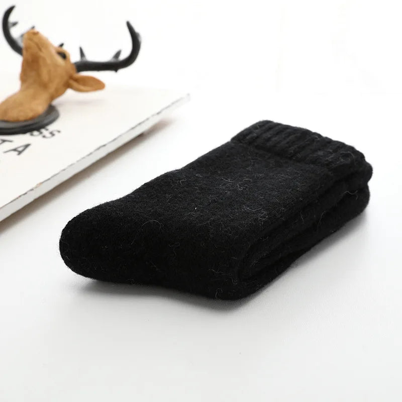 View of dark gray cozy unisex socks, one size fits most, designed for plush comfort and warmth.
