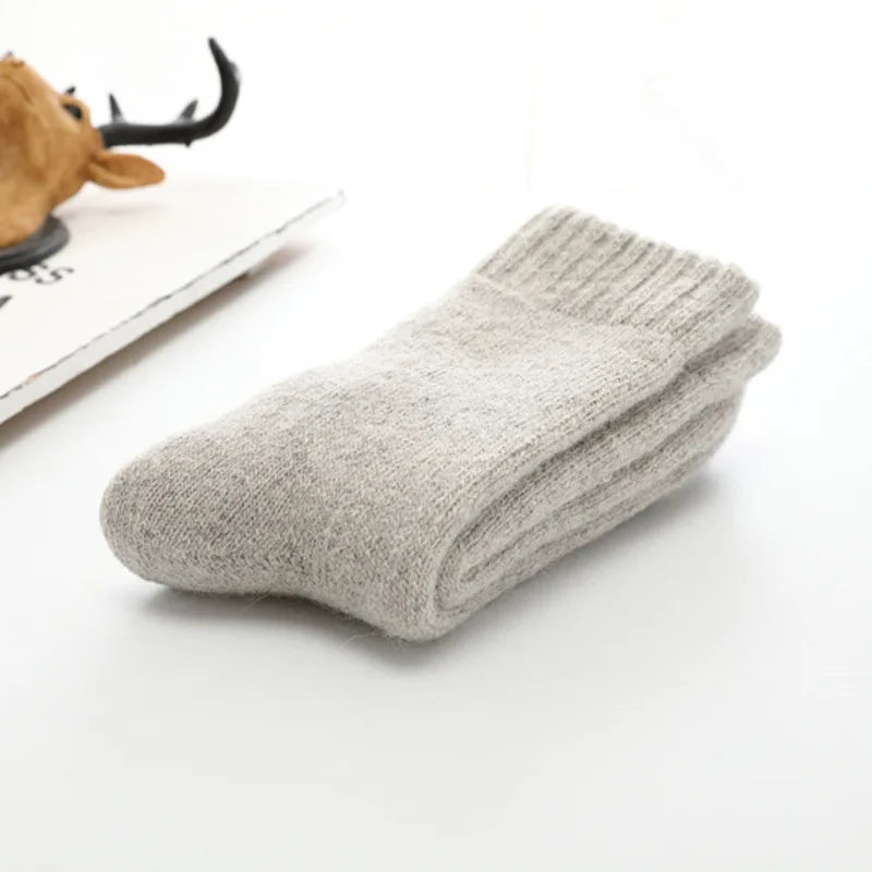 Textured dark gray cozy socks, unisex, one size fits most, offering luxurious warmth and comfort.