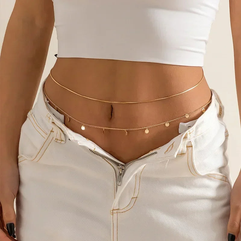 Sparkling double-layer gold waist chain, elegant layering body jewelry with crystals, adjustable for women.