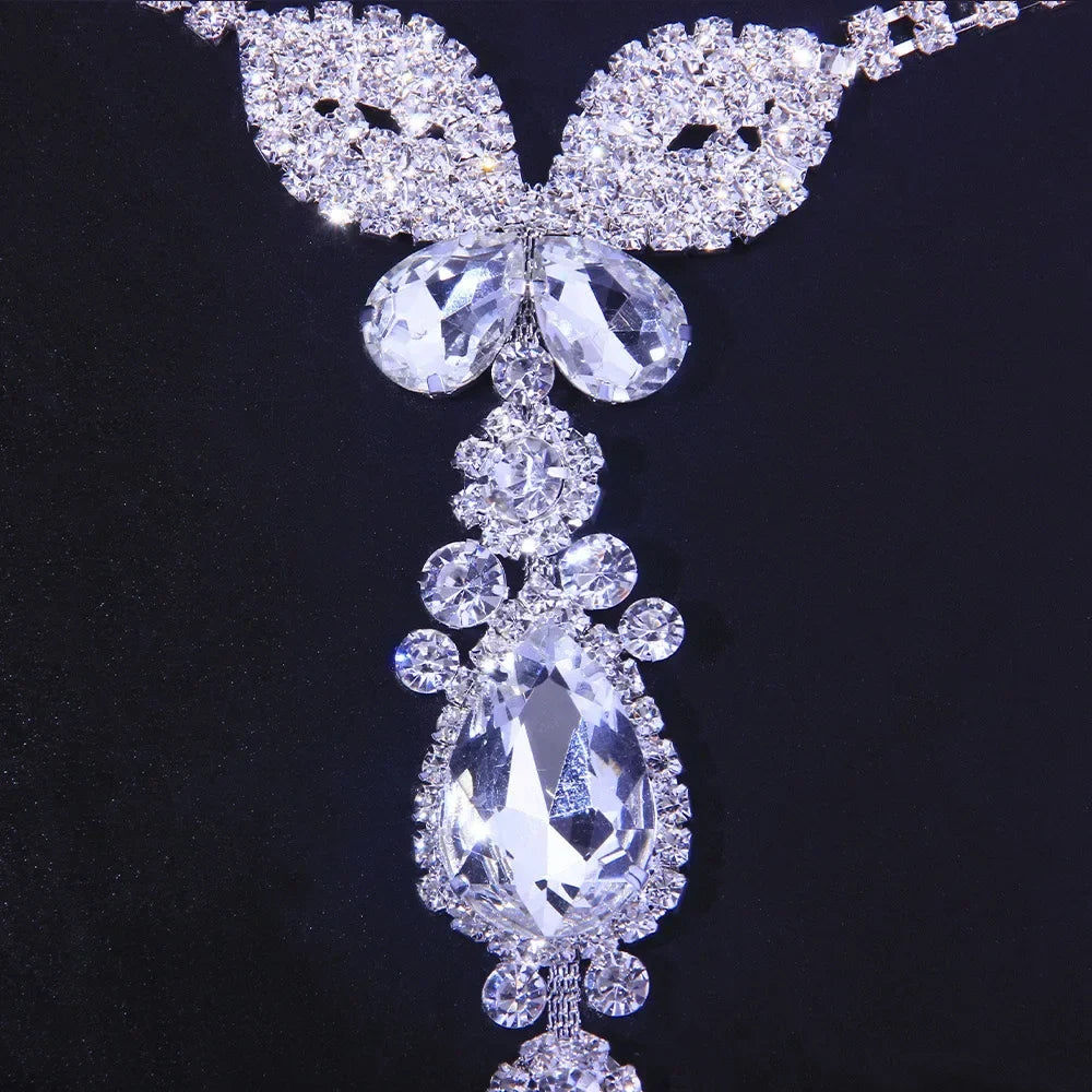 Sparkling rhinestone butterfly belly chain, delicate gold body jewelry for women, crystal waist accessory.