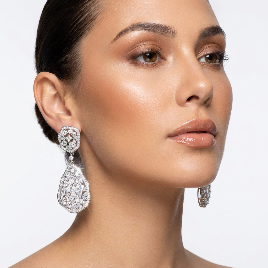 Glamorous green & silver long drop earrings for women, adding radiant sparkle and elegant lightweight style.