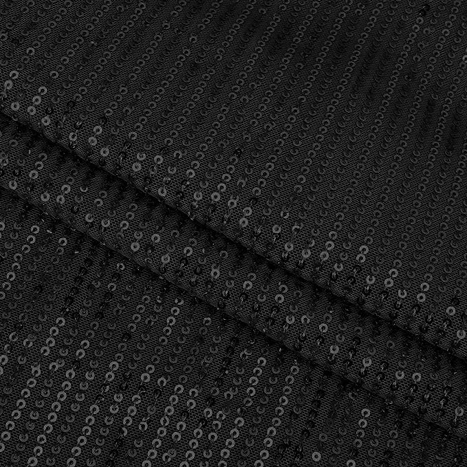 Close-up of intricate dazzling sequins on a glamorous women's mini party dress.
