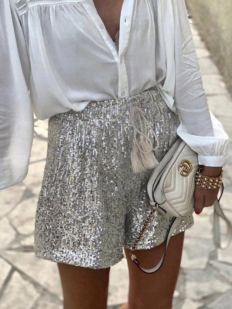 High-waist glam sequin shorts for women, featuring sparkling silver sequins for a chic party look.