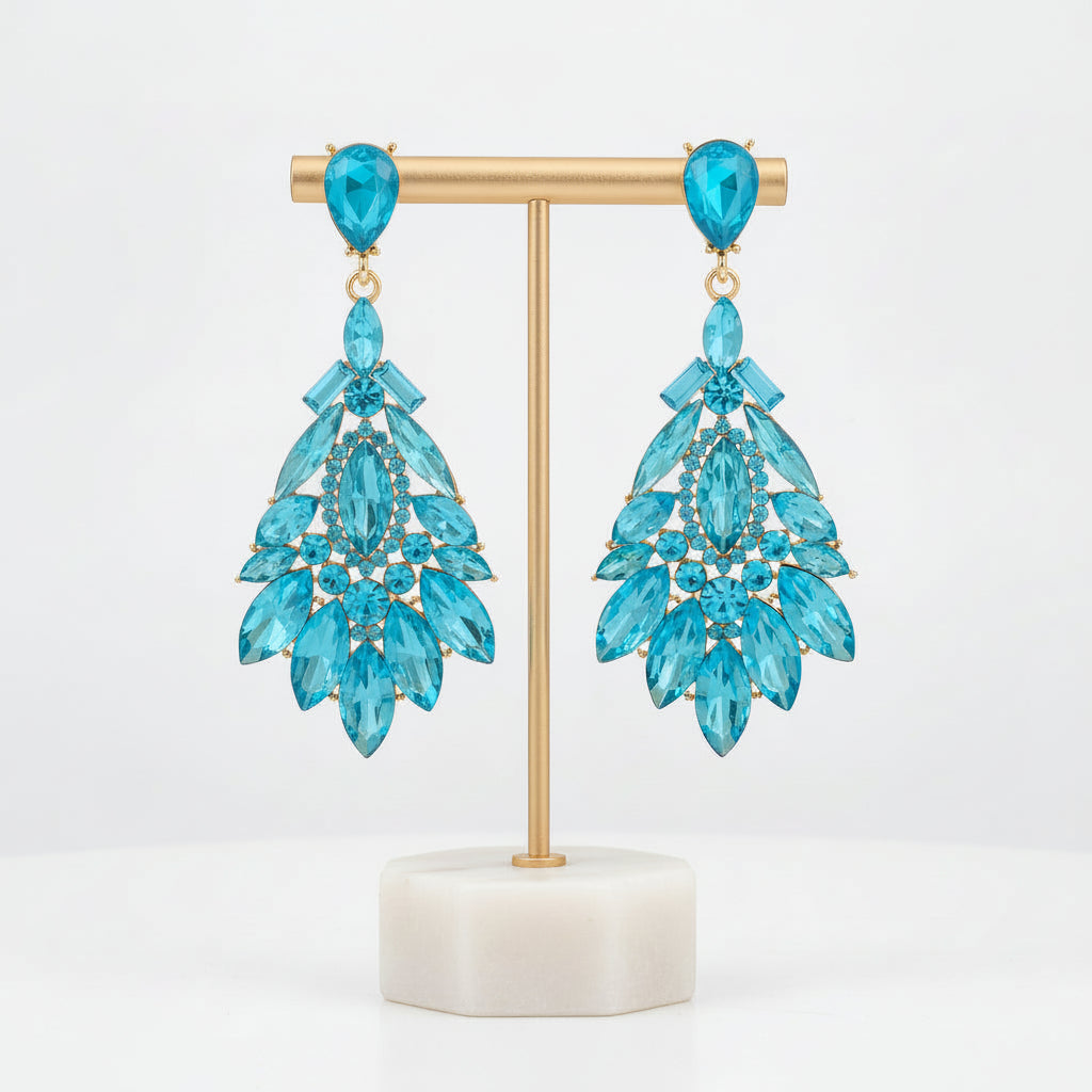 Dazzling white crystal drop earrings, elegant women's dangle jewelry, sparkling fashion accessory.