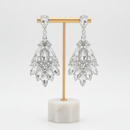 Fashionable women's crystal drop earrings, sparkling dangle jewelry, elegant accessory for any outfit.