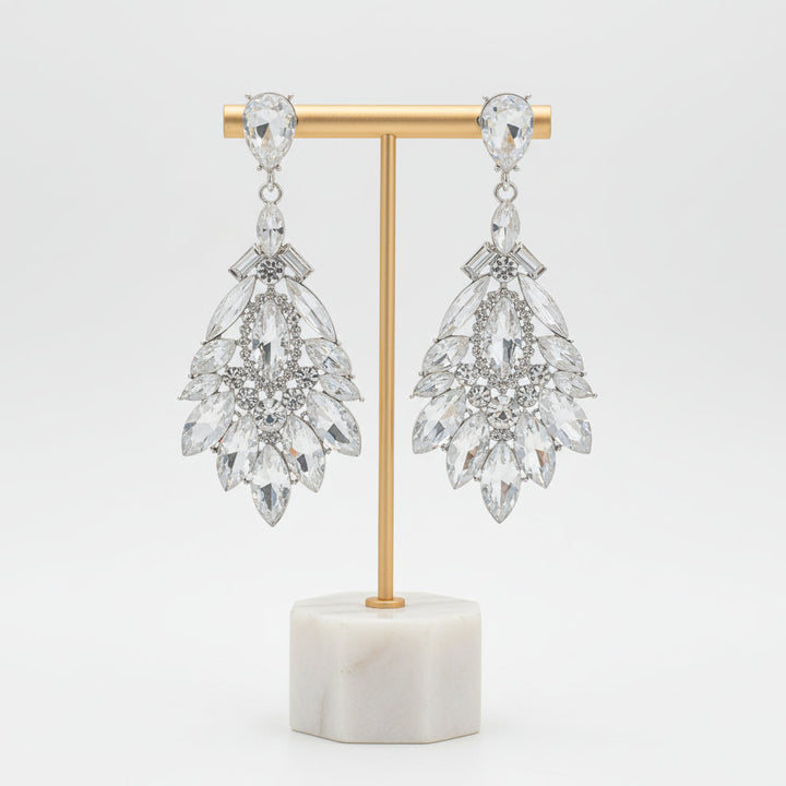 Fashionable women's crystal drop earrings, sparkling dangle jewelry, elegant accessory for any outfit.
