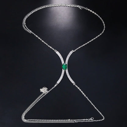 Women's gold tone rhinestone body chain, a dazzling crystal chest chain. Elegant fashion accessory for special occasions.
