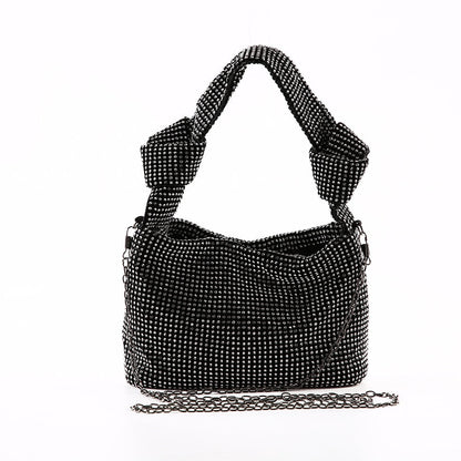 Sparkly women's metallic rhinestone handbag, a glamorous accessory for evening events.