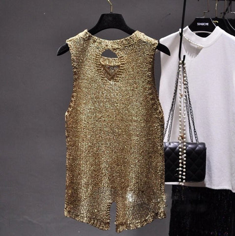 Elegant women's sequin top, sparkling and stylish for a chic party or glamorous evening fashion statement.