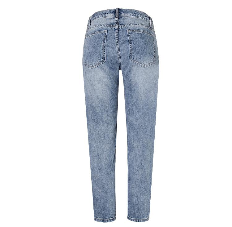 Stylish women's ripped jeans featuring shimmering sequins, ideal for party wear or a casual chic look. Fashion pants with sparkle.