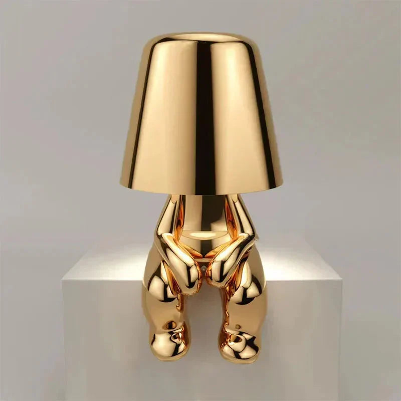 Sleek LED table lamp, dimmable and cordless, creating cozy accent lighting.