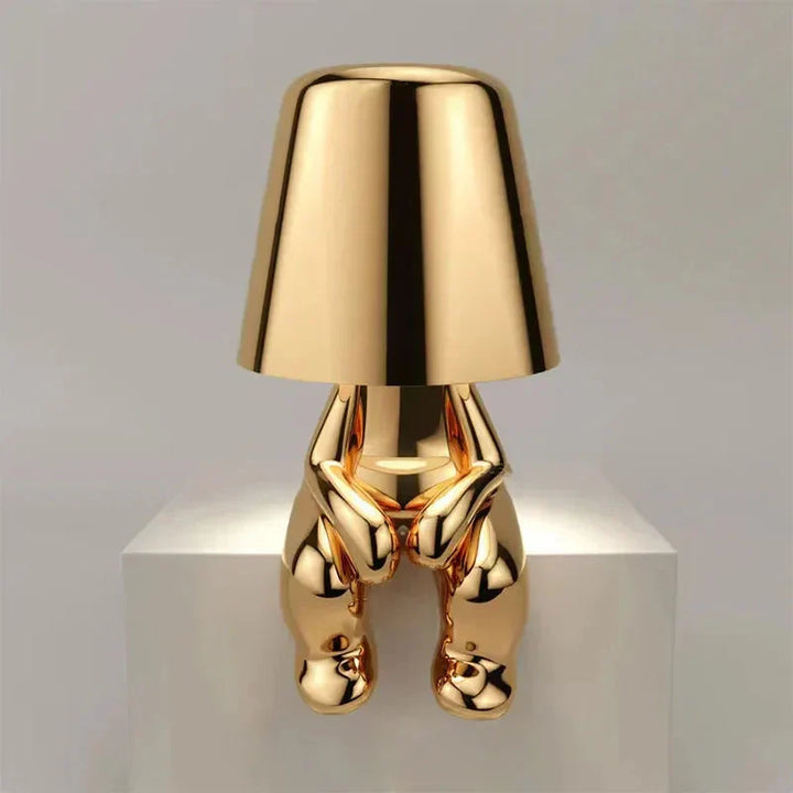 Sleek LED table lamp, dimmable and cordless, creating cozy accent lighting.