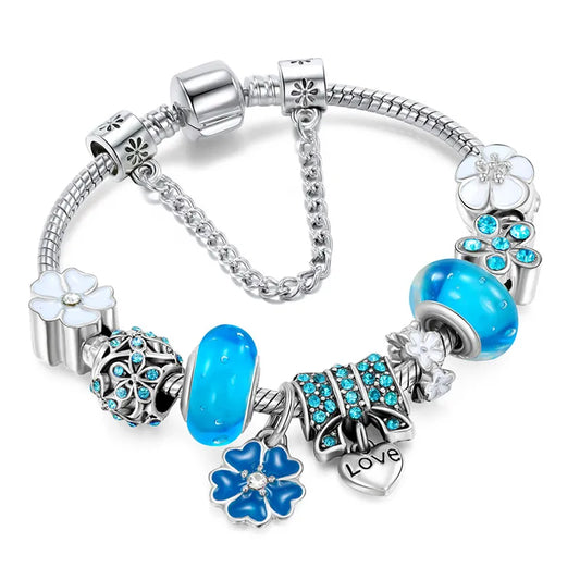 Delicate stainless steel women's peach blossom charm bracelet, elegant floral jewelry for a sophisticated look.