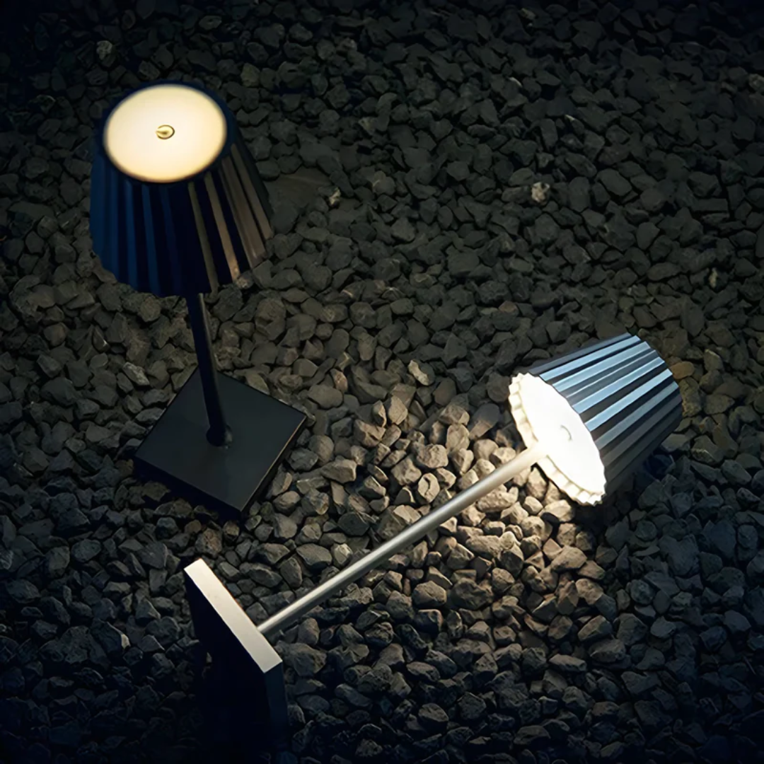Stylish aluminum rechargeable touch lamp, dimmable LED lighting for modern indoor & outdoor decor.