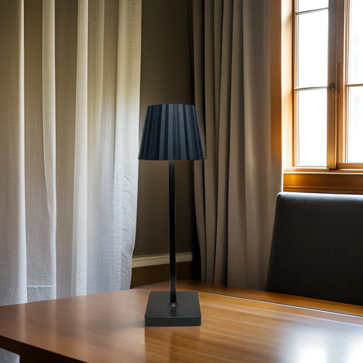 Sleek aluminum dimmable touch lamp, providing versatile LED light for any modern home or office space.