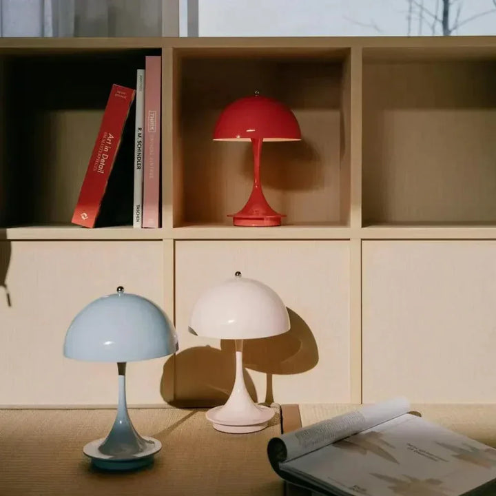 Elegant dimmable LED flower bud table lamp, wireless & rechargeable, perfect for mood lighting.