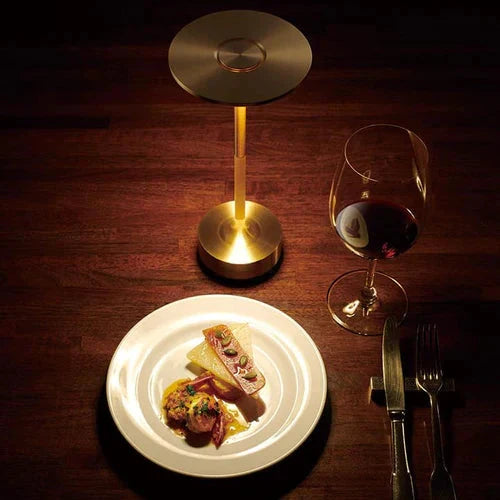 Stylish modern wireless table lamp. Dimmable LED light, perfect for desks, bedrooms, or patios.