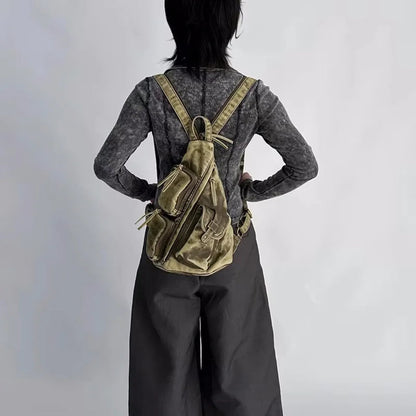 Women's distressed convertible backpack sling bag. Vintage style, versatile for daily use & travel.