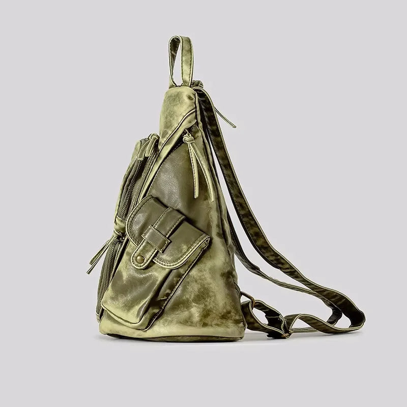Women's distressed convertible backpack & sling bag with vintage style, perfect for versatile daily use.
