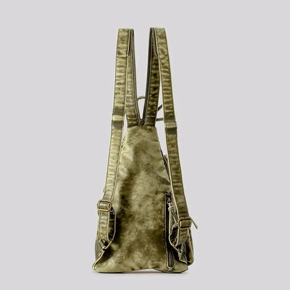 Vintage-style distressed women's convertible backpack. A versatile fashion accessory for travel or daily use.