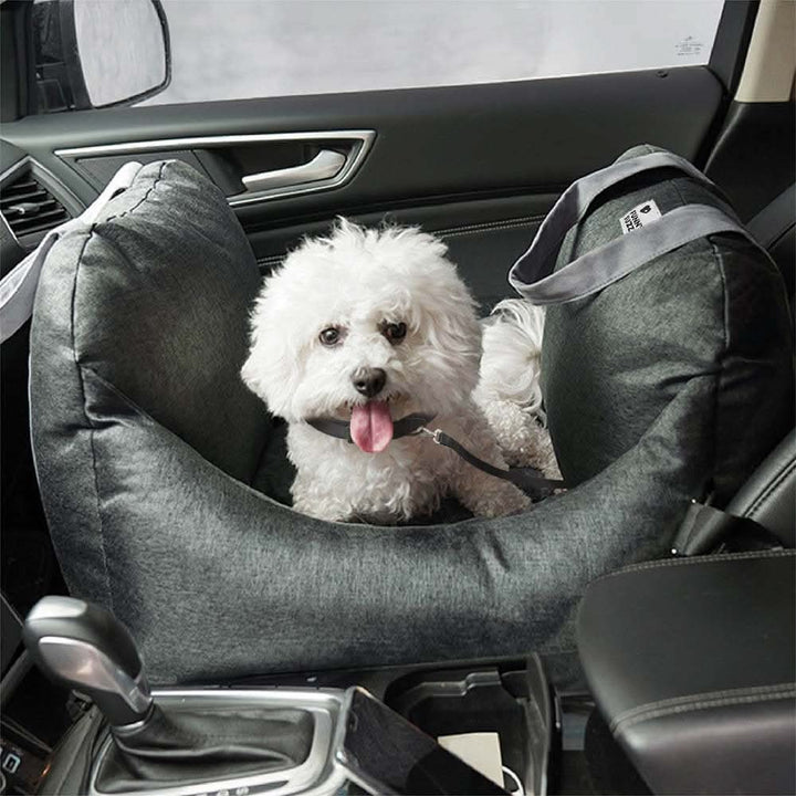 Dog booster car seat with safety belt for secure pet travel. Elevates small dogs for a better view.