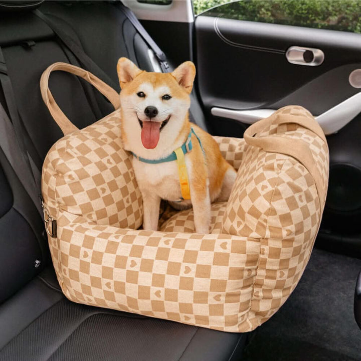 Front view of a dog booster car seat showing its safety belt & comfortable washable bed for pet travel.
