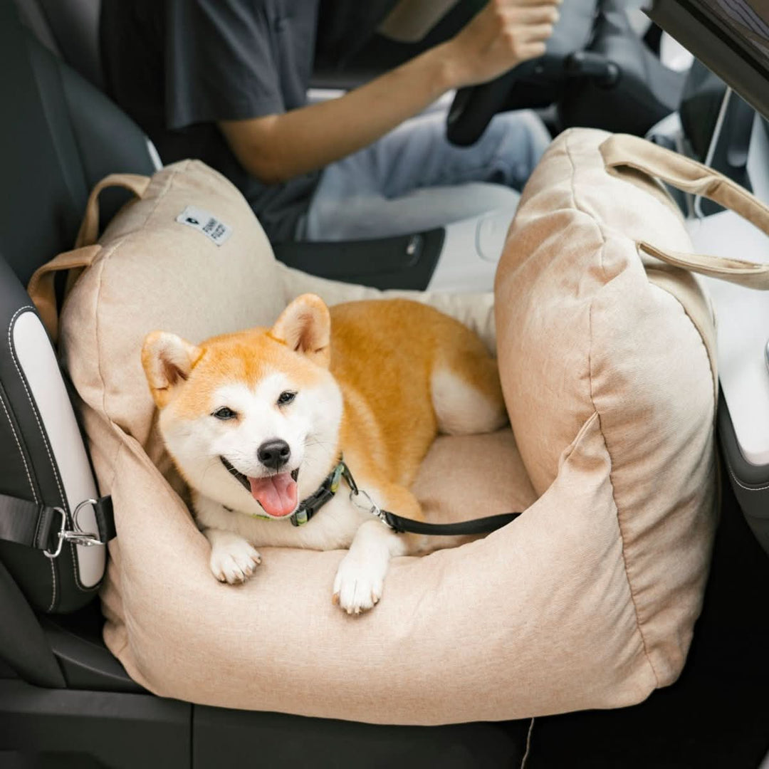 Easy-to-install dog booster car seat with adjustable safety belt and non-slip base for all vehicles.