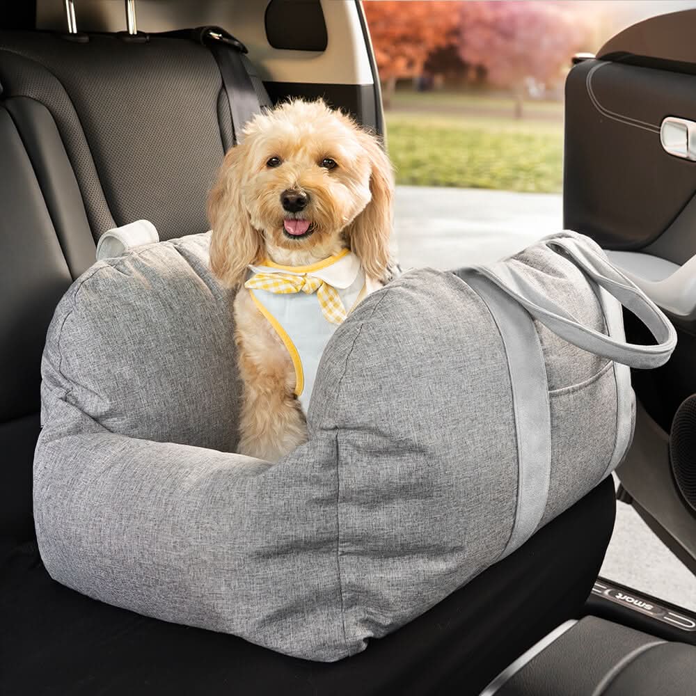 Secure pet travel booster seat for dogs, preventing slips with its non-slip base & strong safety belt.