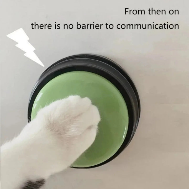 Dog pressing a talking button, demonstrating effective pet communication & vocal training.