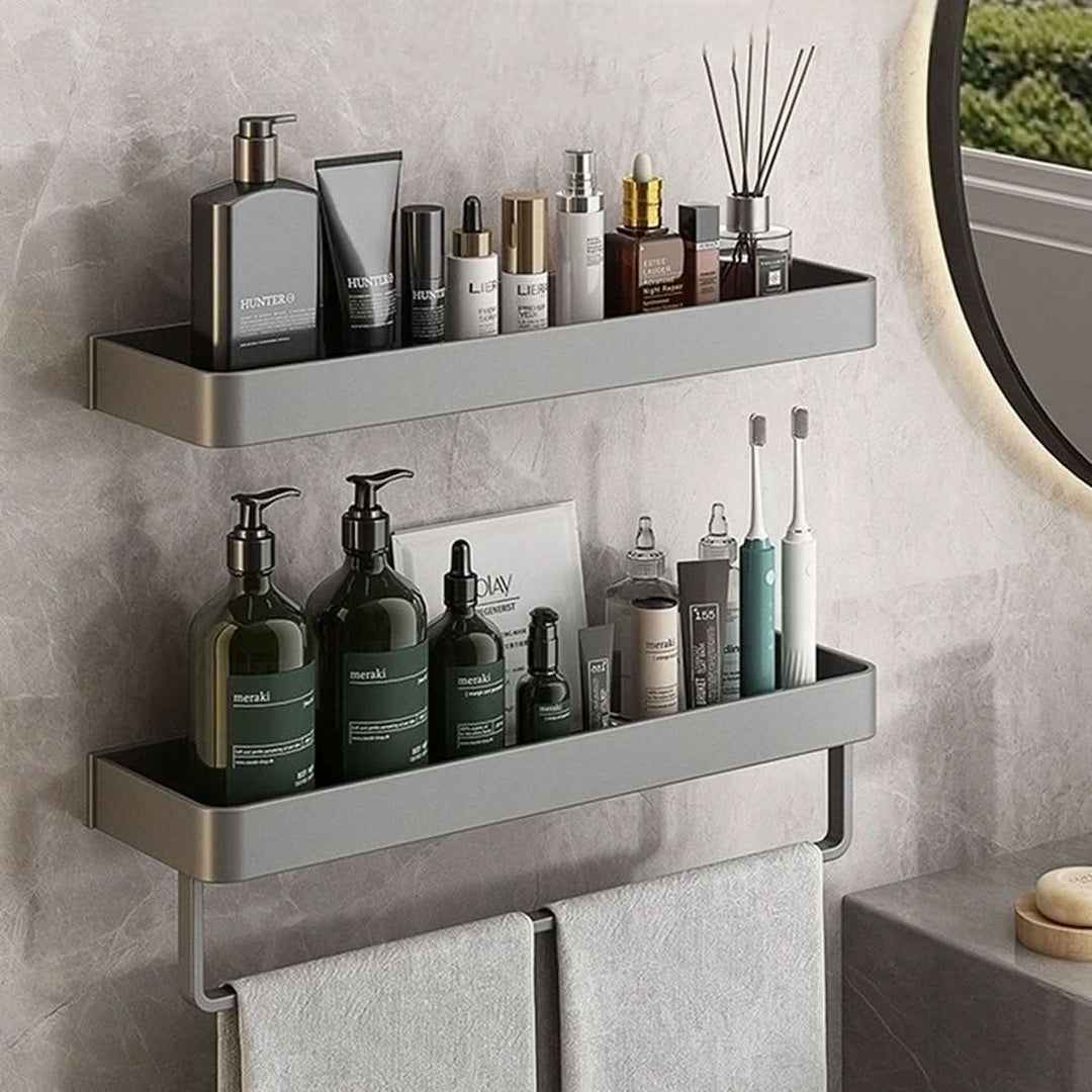 Modern drill-free bathroom shelf with towel bar. Organize toiletries & maximize space with wall mounting.