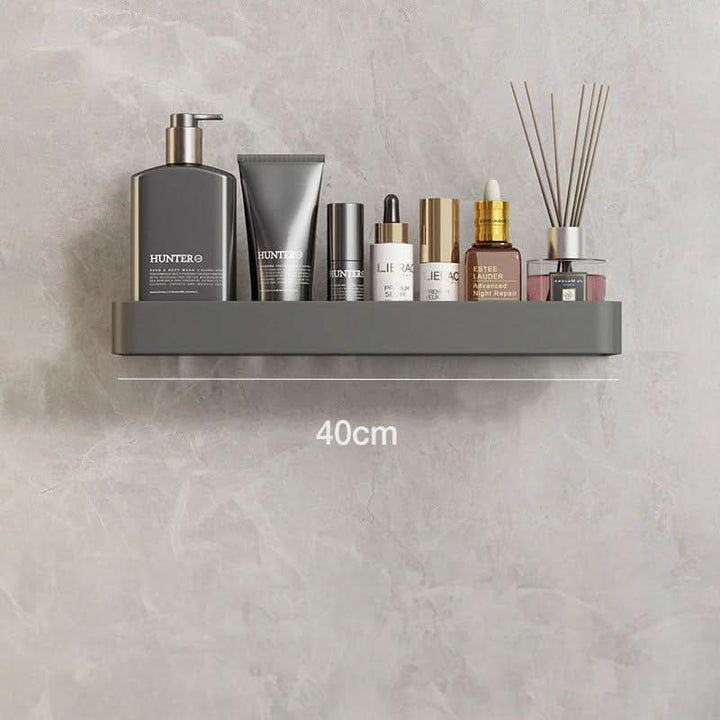 Sleek drill-free bathroom storage shelf with towel bar. Ideal for modern home organization & essentials.