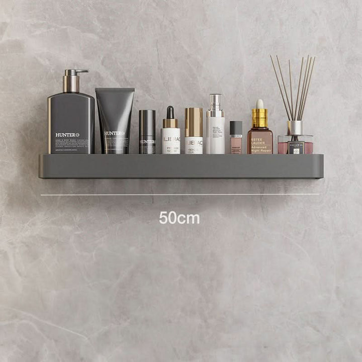Functional drill-free bathroom organizer shelf for toiletries, towels. Space-saving wall-mounted storage.