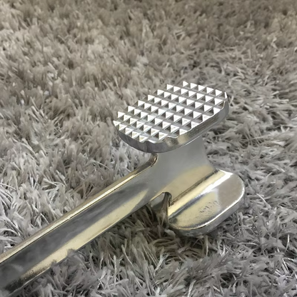 Dual-sided meat tenderizer hammer for home cooking, perfect for beef, chicken & pork.