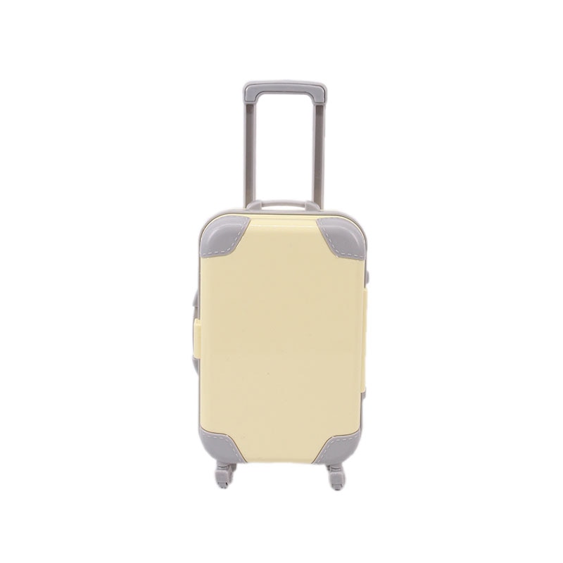 Children's toy suitcase, sized for 18-inch dolls, promoting creative travel play.