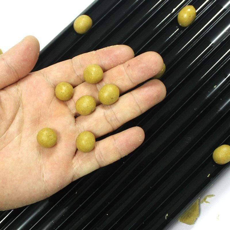 Carp fishing boilies bait roller table, a robust 'fishing bait maker' for consistent bait prep. Fishing accessory.