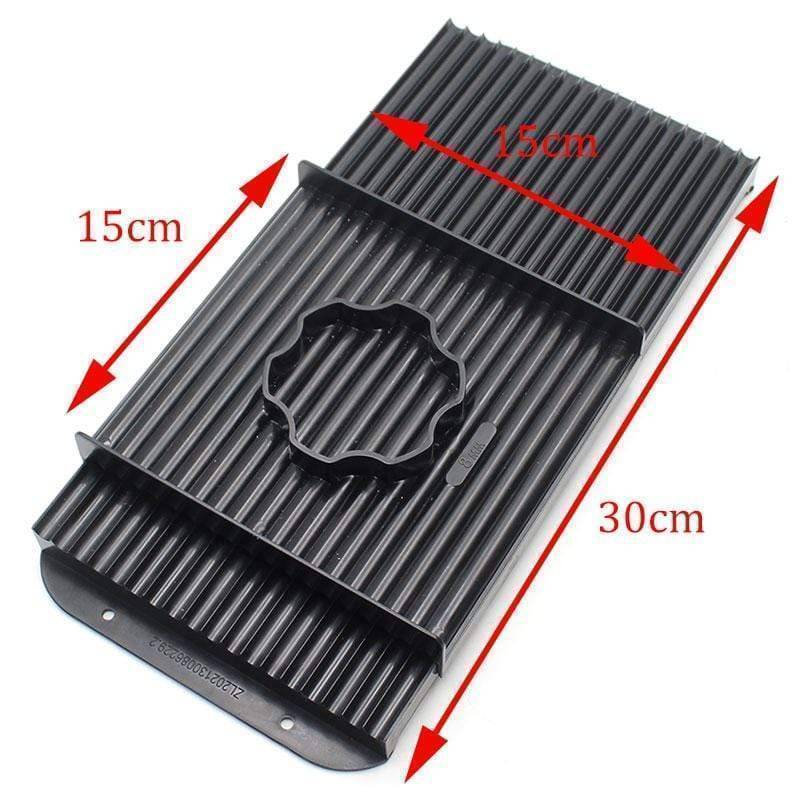 Close-up of carp fishing boilies bait roller table, showing 'boilie roller' design for uniform baits.