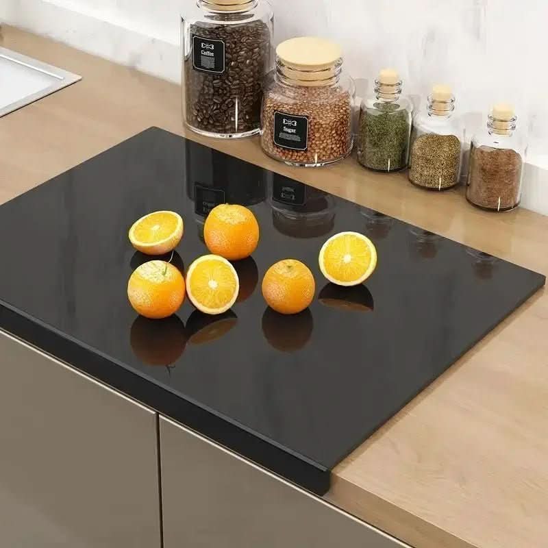 Durable acrylic cutting board with countertop lip protects surfaces during food prep. Non-slip design, easy clean kitchen tool.