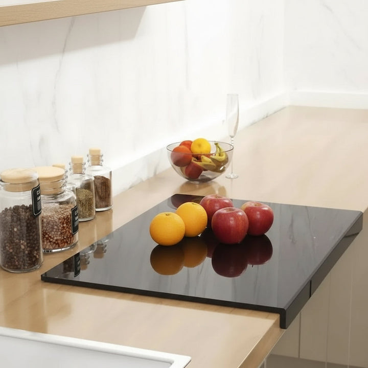 Non-slip acrylic cutting board with a protective countertop lip. Ideal for food prep, keeps kitchen surfaces clean & safe.