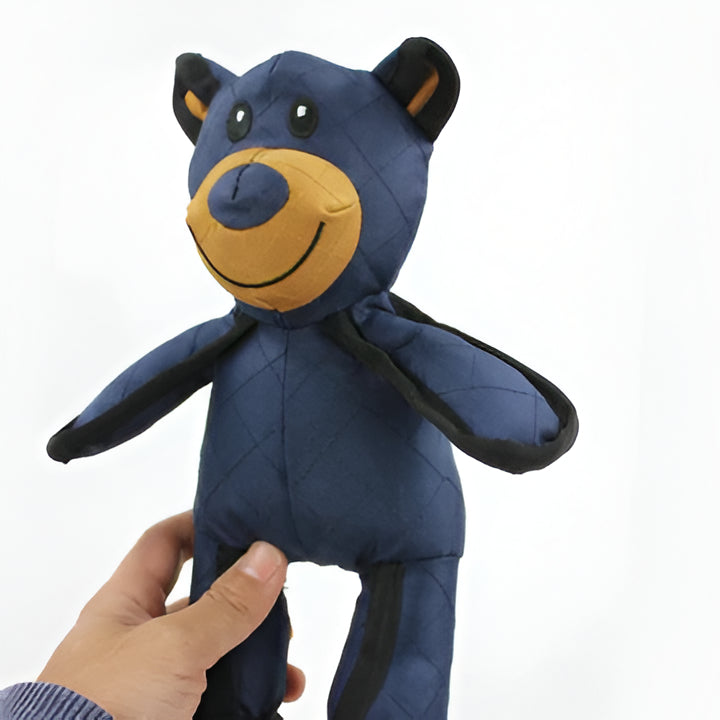 Interactive bear dog toy for heavy chewers, a durable and indestructible pet toy built to withstand aggressive chewing.