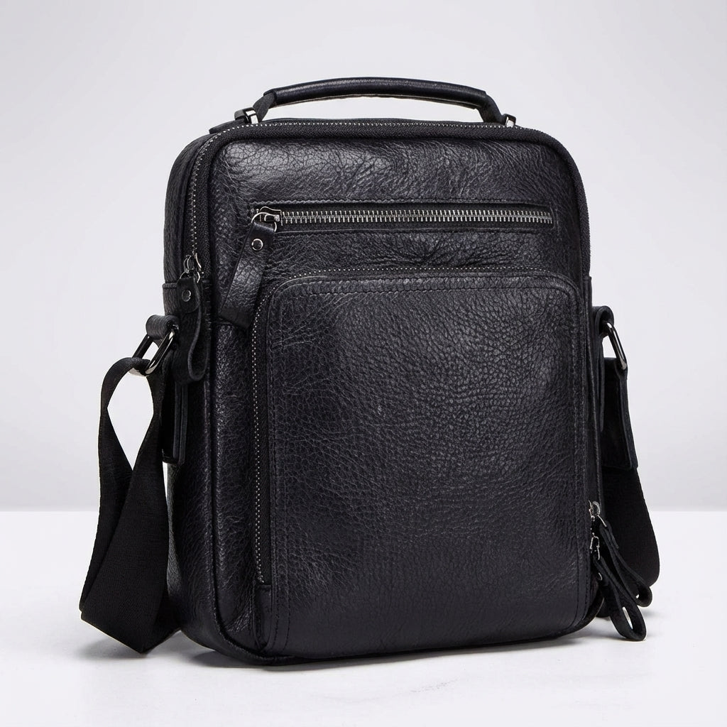 Compact leather shoulder bag, ideal for student use & daily essentials. Durable unisex design for work & travel.