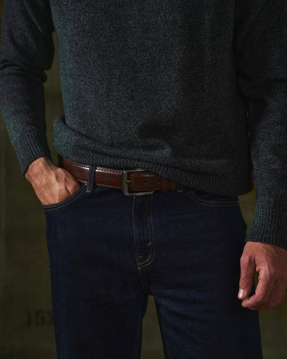 Sleek black men's full-grain leather belt. Durable & essential accessory for timeless men's fashion.
