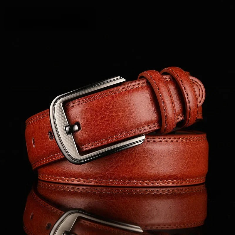 Close-up of a durable men's full-grain leather belt, showcasing rich leather texture & classic design.