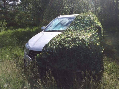 Tactical camouflage netting, robust and lightweight, for effective hunting and sun shelter.