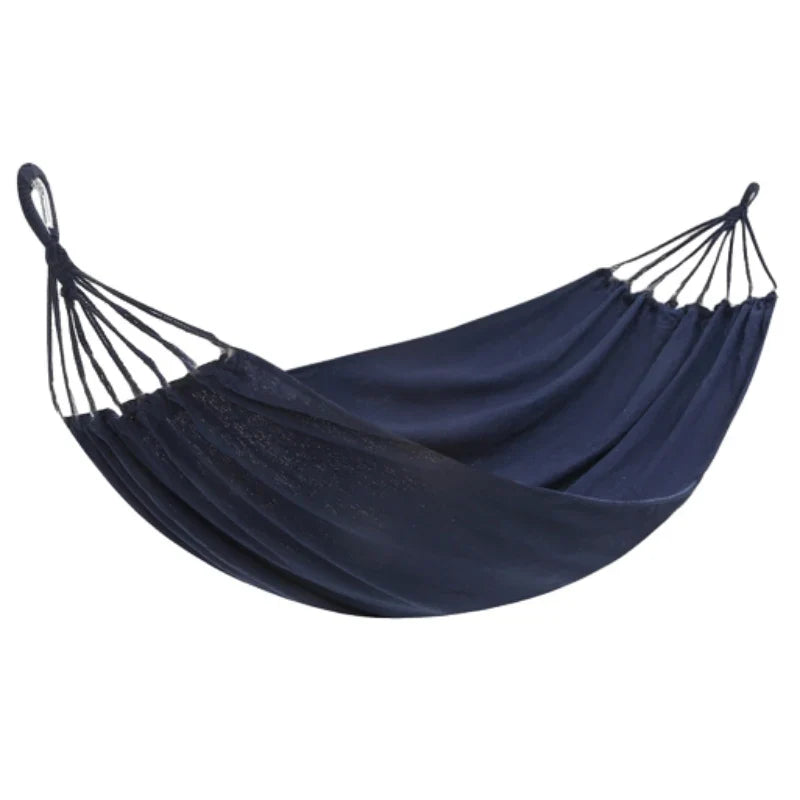 High-quality outdoor canvas hammock with integrated spreader bars, ensuring stability for camping and backyard