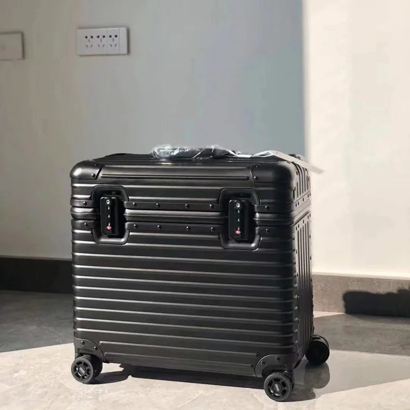 Unisex aluminum hard shell travel luggage with multi-directional wheels, built for durability & ease.