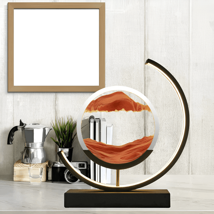 Stylish dynamic sand art lamp for home decor, featuring a mesmerizing moving sandscape & LED ambient light.