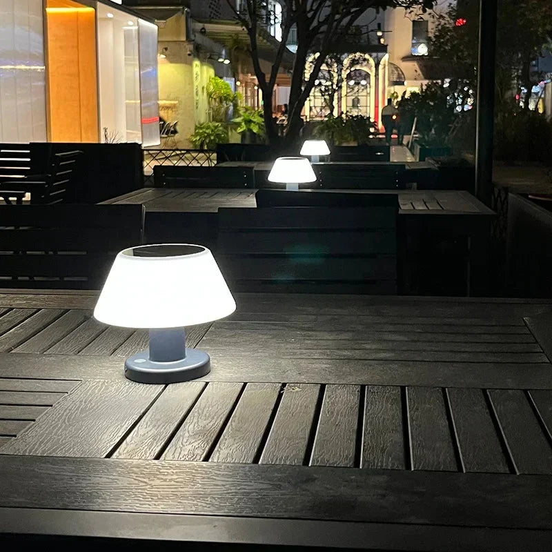 Eco-friendly EcoGlow solar table lamp, a wireless LED light for sustainable outdoor & indoor illumination.