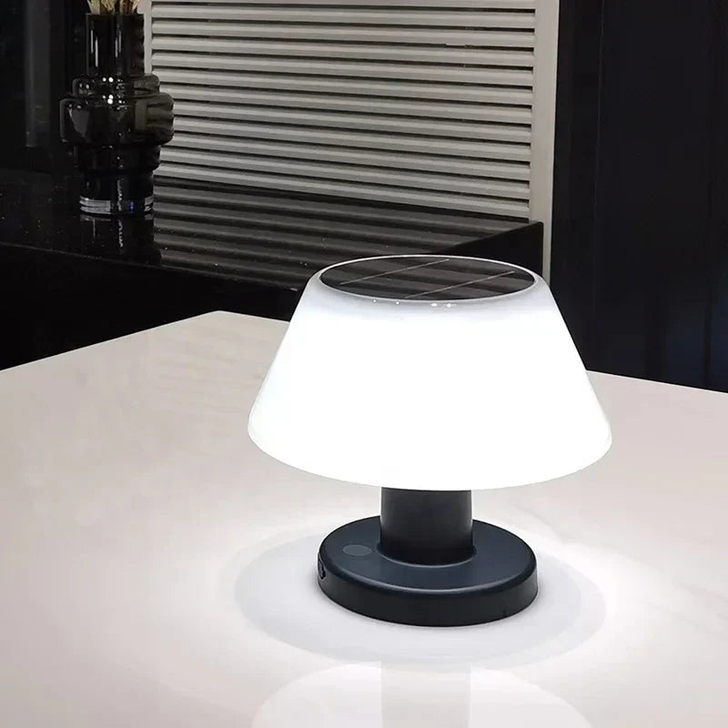 EcoGlow solar table lamp in a cozy setting. Wireless LED light, perfect for evening outdoor dining or indoor reading.